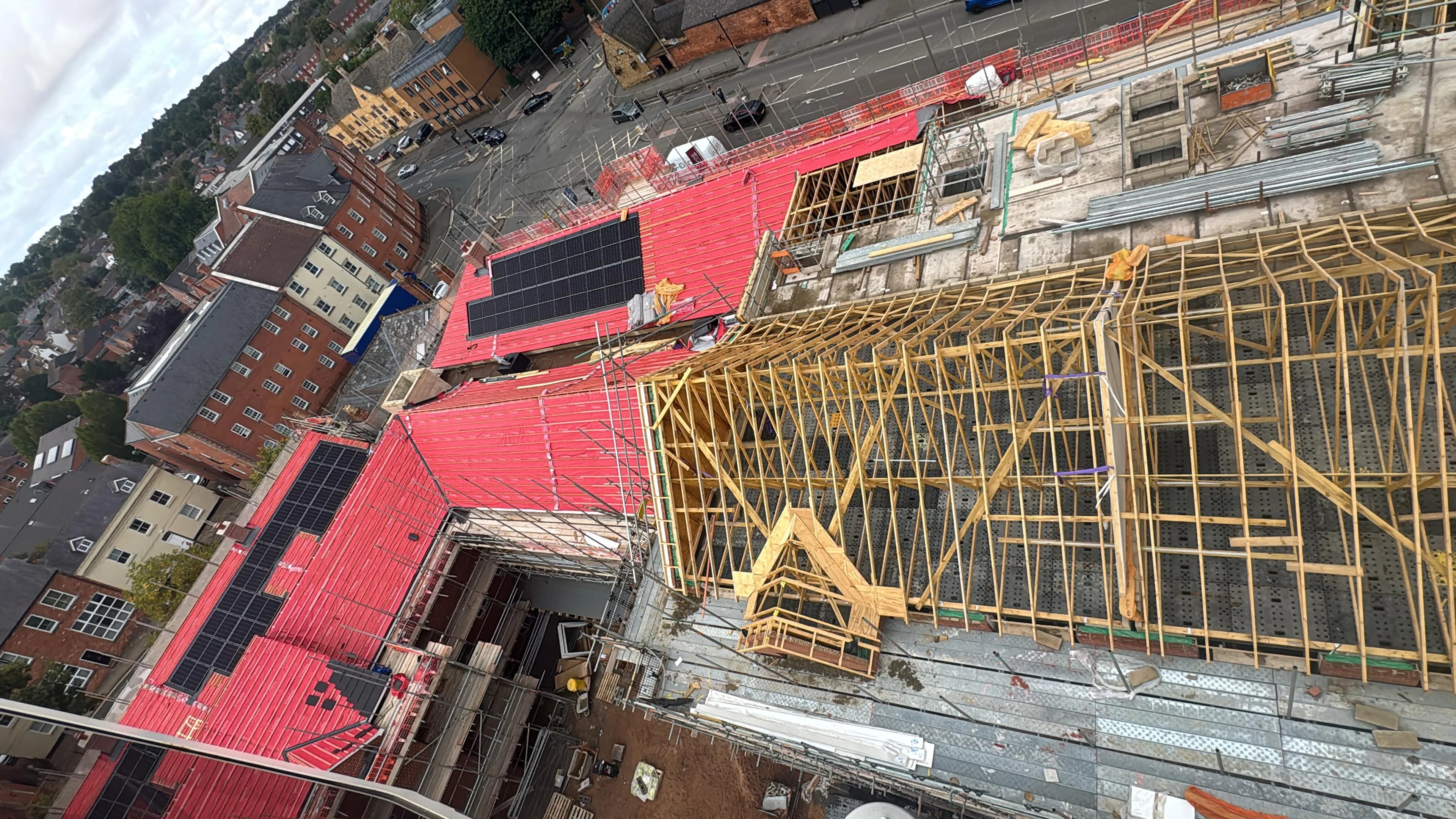 Aerial view of roof timbers and membrane during a re-roof