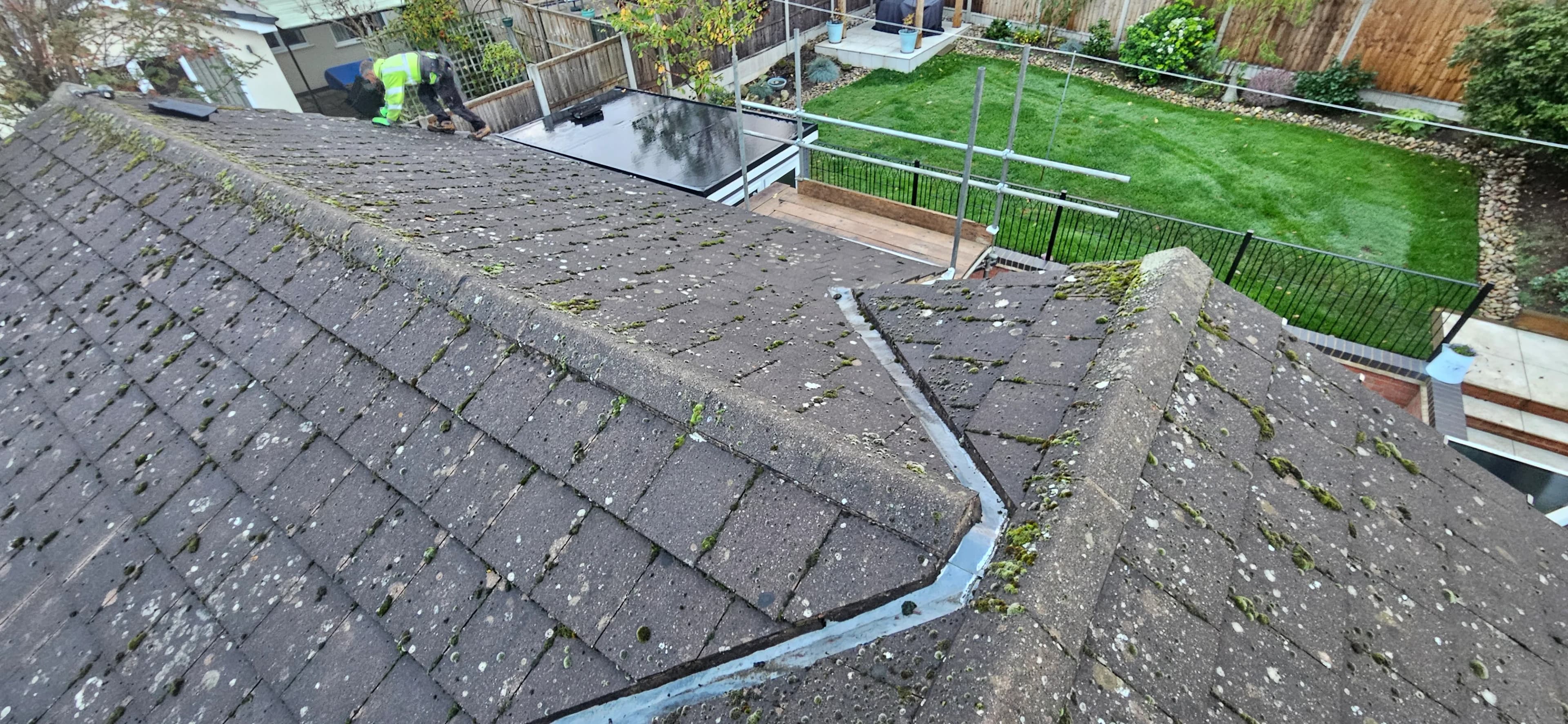 Slate roof with lead valley overlooking a rear garden