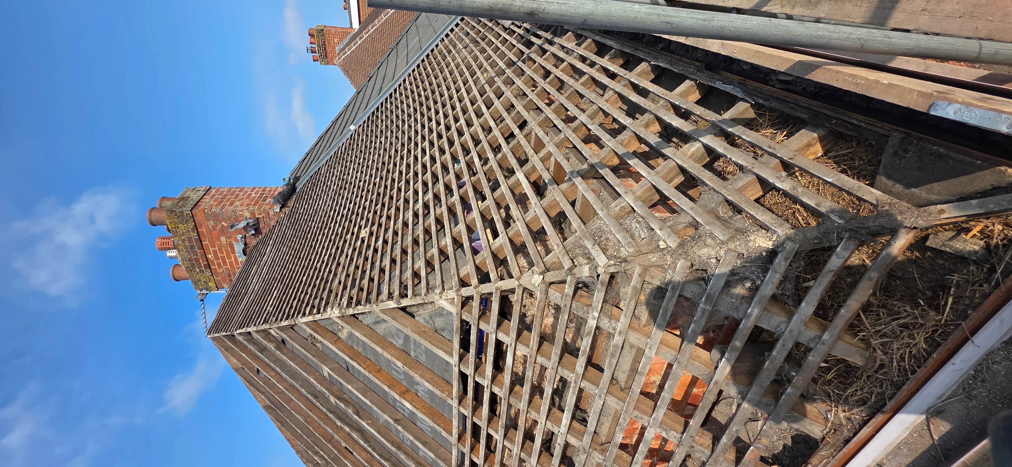Access scaffolding tower against a clear blue sky